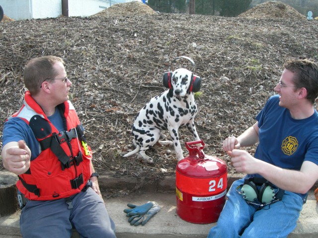 Even Lucky has hearing protection during boat drills!